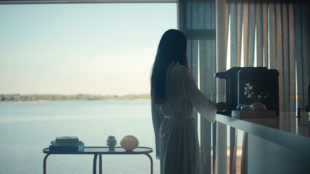 A serene daily ritual scene with the X20 beside a panoramic water view