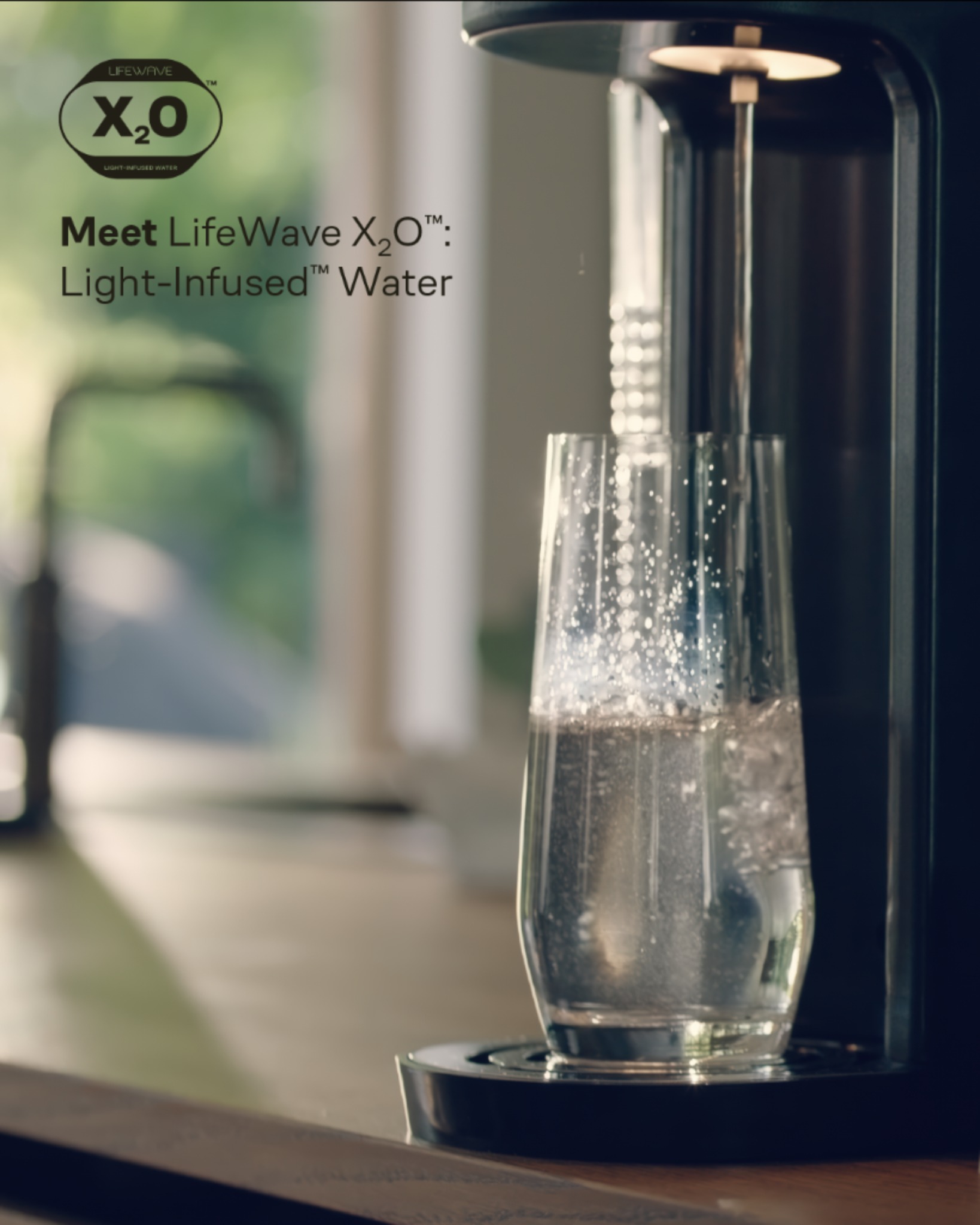 LifeWave X2O pouring light-infused water into a glass