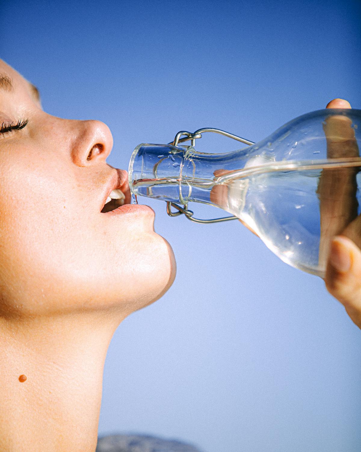 Woman enjoying pure X20 water